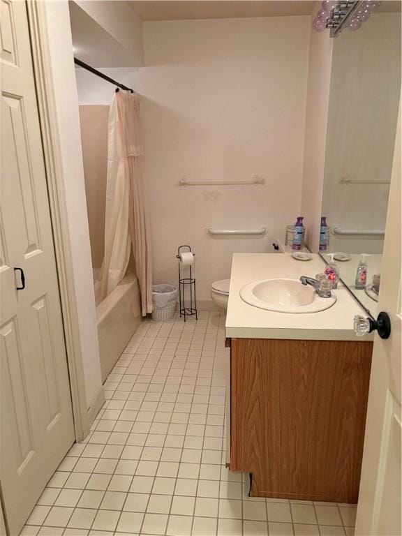 37 Trellis Dr Unit 37, West Warwick, RI 02893 - bathroom featuring tile patterned flooring, vanity, shower / bath combination with curtain, and toilet