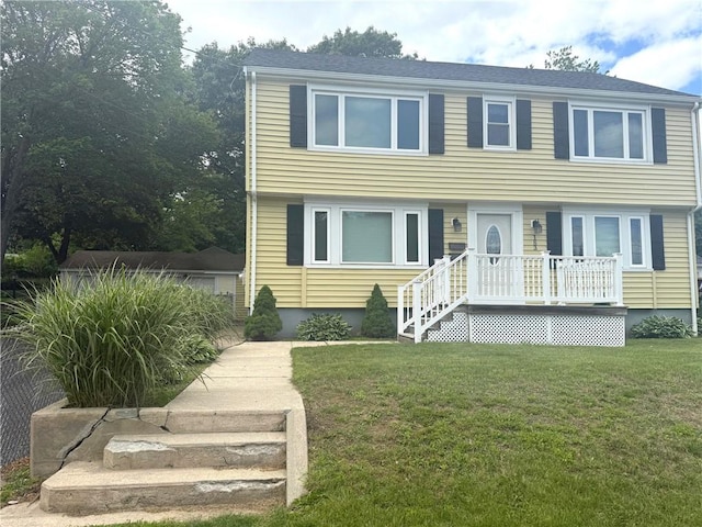 183 Linden Ave, Woonsocket, RI 02895 - view of front facade featuring a front yard