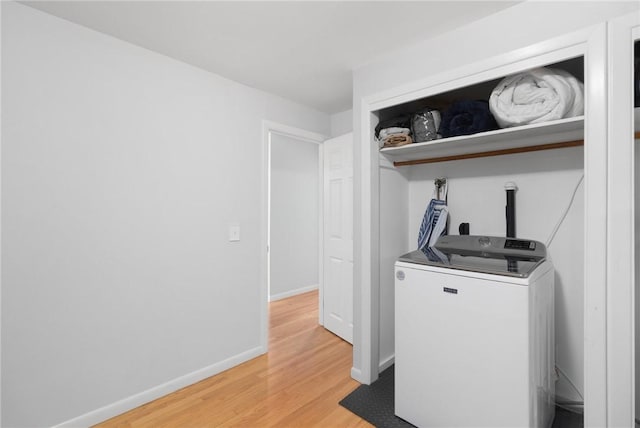 80 Flagg Ave, Warwick, RI 02886 - laundry room featuring washer / clothes dryer, light wood finished floors, and baseboards
