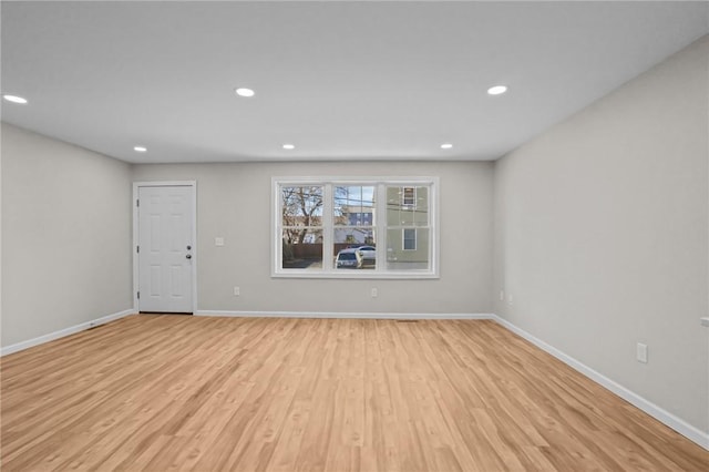 17 Judith St, Providence, RI 02909 - unfurnished living room with light wood finished floors, recessed lighting, and baseboards