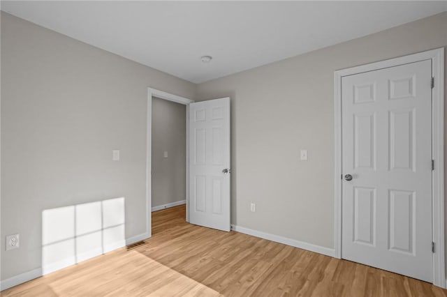 17 Judith St, Providence, RI 02909 - unfurnished bedroom featuring baseboards and light wood-type flooring