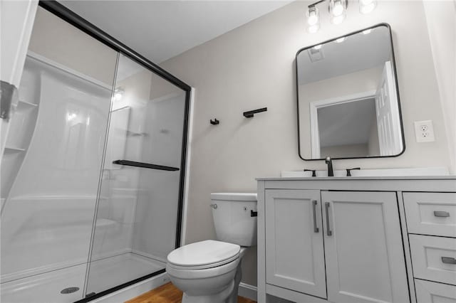 17 Judith St, Providence, RI 02909 - full bathroom featuring toilet, vanity, a shower stall, and wood finished floors