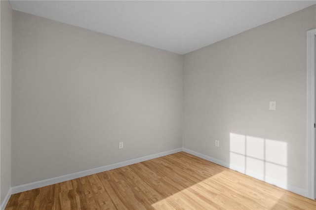 17 Judith St, Providence, RI 02909 - unfurnished room with wood finished floors and baseboards