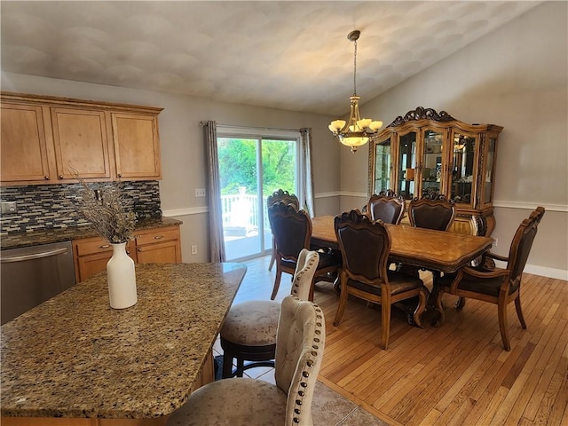49 Wine St, Cranston, RI 02920 - dining room with a chandelier, light wood finished floors, lofted ceiling, and baseboards