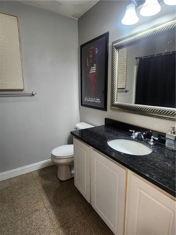 49 Wine St, Cranston, RI 02920 - bathroom featuring vanity, baseboards, toilet, and a shower with curtain