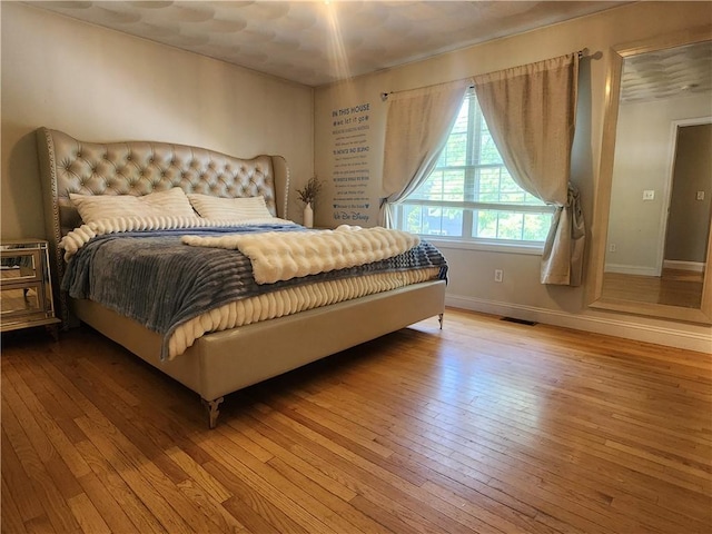 49 Wine St, Cranston, RI 02920 - bedroom featuring hardwood / wood-style flooring and baseboards