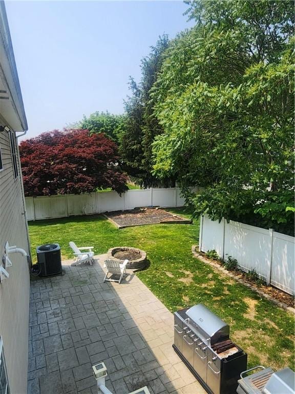 49 Wine St, Cranston, RI 02920 - view of patio / terrace featuring an outdoor fire pit, central AC unit, and a grill