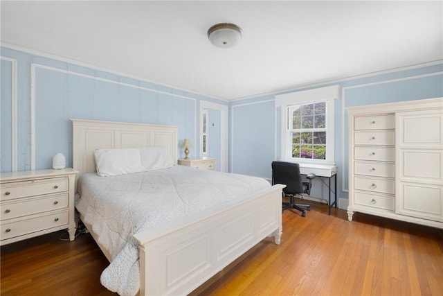 2 Carvin Ct, Warwick, RI 02886 - bedroom with hardwood / wood-style floors, a decorative wall, and an office area