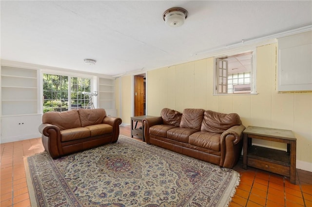 2 Carvin Ct, Warwick, RI 02886 - tiled living room with built in shelves