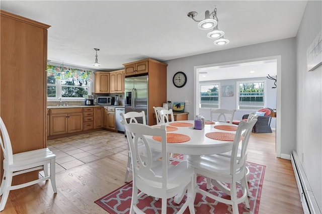 37 Seabreeze Ter, South Kingstown, RI 02879 - dining area featuring baseboard heating and light wood-style flooring