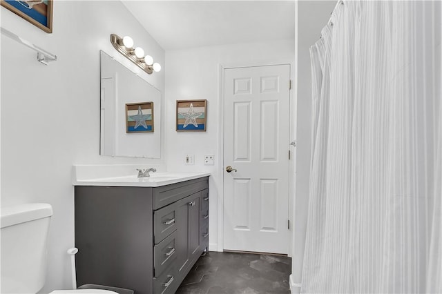 37 Seabreeze Ter, South Kingstown, RI 02879 - bathroom featuring vanity, toilet, and curtained shower