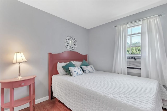 37 Seabreeze Ter, South Kingstown, RI 02879 - bedroom featuring wood finished floors, baseboards, and cooling unit