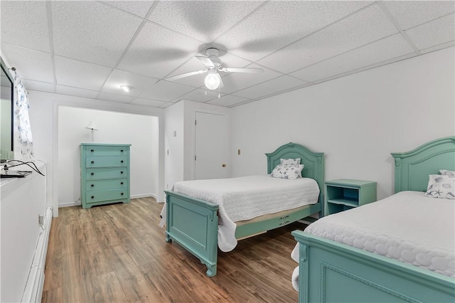 37 Seabreeze Ter, South Kingstown, RI 02879 - bedroom with a drop ceiling, wood finished floors, and ceiling fan