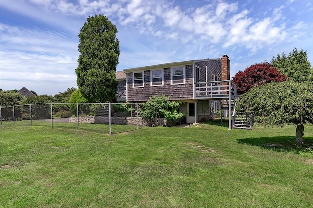 37 Seabreeze Ter, South Kingstown, RI 02879 - back of property featuring a deck, a chimney, and stairs