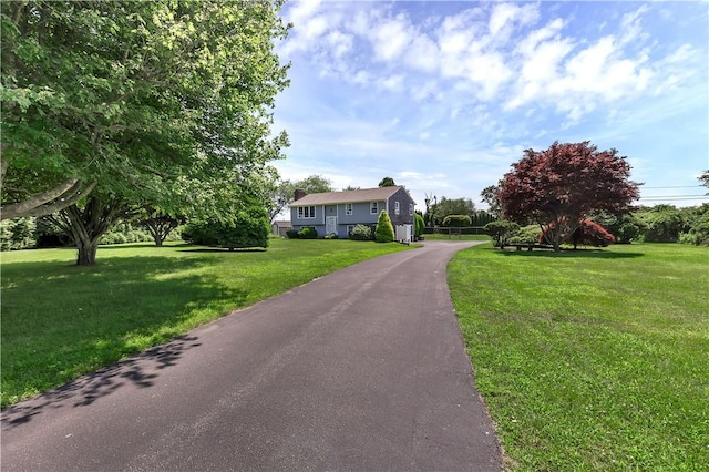 37 Seabreeze Ter, South Kingstown, RI 02879 - view of front of property featuring a front lawn