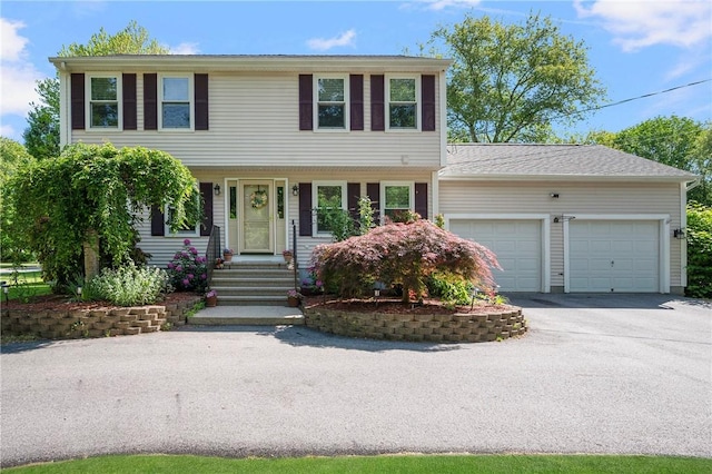 680 S Main St, Burrillville, RI 02859 - colonial inspired home featuring an attached garage and driveway