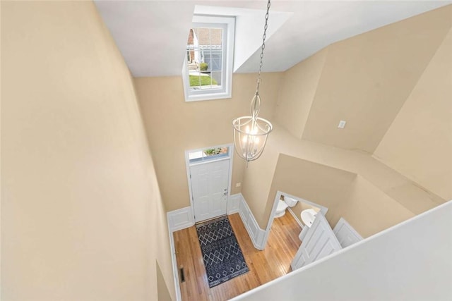 156 Hampton Way S, Kingstown, RI 02879 - entrance foyer with wood finished floors and a chandelier