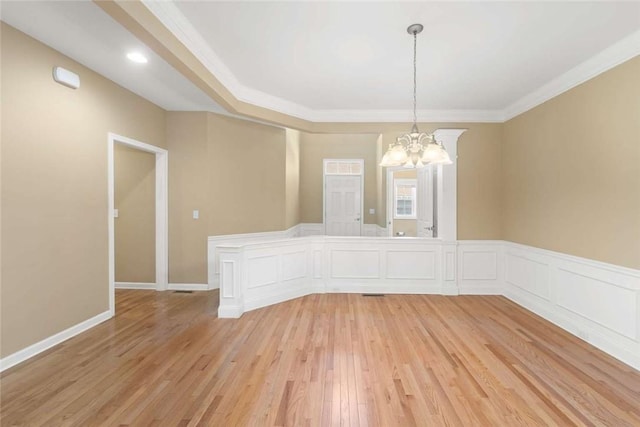 156 Hampton Way S, Kingstown, RI 02879 - unfurnished dining area with a chandelier, light wood finished floors, and ornamental molding