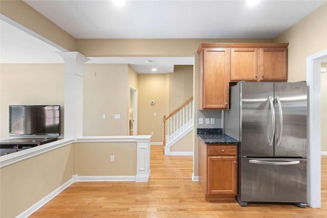 156 Hampton Way S, Kingstown, RI 02879 - kitchen with freestanding refrigerator, light wood finished floors, decorative backsplash, brown cabinets, and recessed lighting
