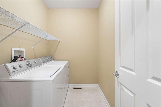 156 Hampton Way S, Kingstown, RI 02879 - laundry area with washer and clothes dryer and baseboards