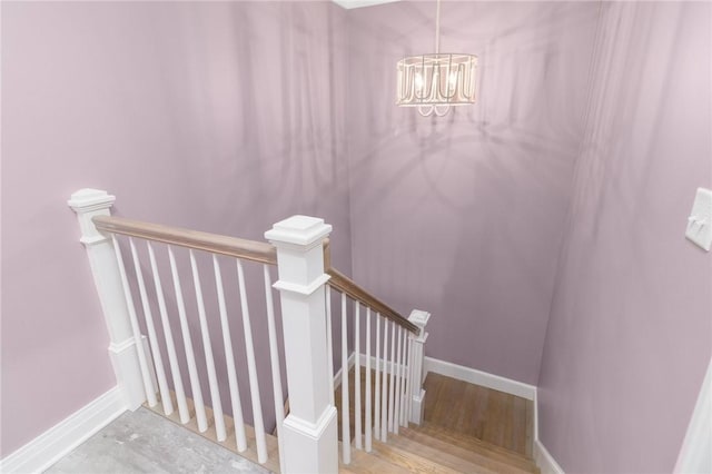 23 Middleberry Ln, East Greenwich, RI 02818 - staircase featuring a chandelier and baseboards