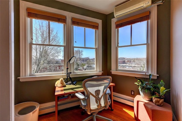 384 Benefit St Unit 2, Providence, RI 02903 - office area with a wall mounted air conditioner, baseboard heating, and wood finished floors