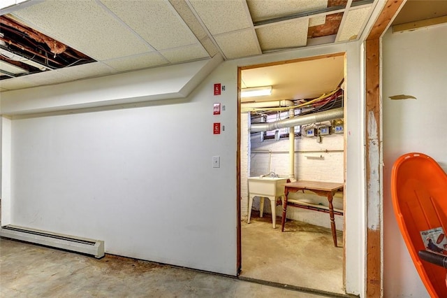 384 Benefit St Unit 2, Providence, RI 02903 - hall with baseboard heating and unfinished concrete flooring
