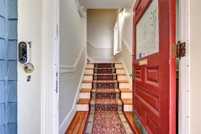 384 Benefit St Unit 2, Providence, RI 02903 - stairs with wood finished floors and baseboards