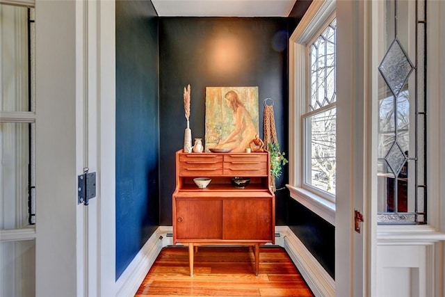 384 Benefit St Unit 2, Providence, RI 02903 - detailed view of wood finished floors and baseboards