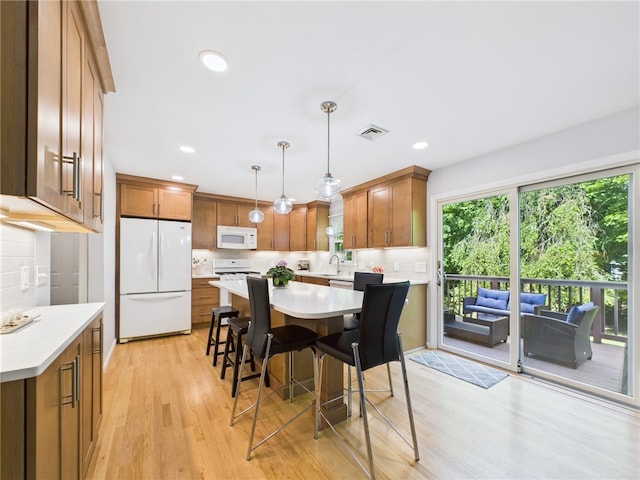 64 E Park Ln, South Kingstown, RI 02879 - dining area featuring light wood-type flooring and recessed lighting