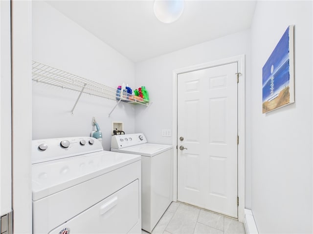 64 E Park Ln, South Kingstown, RI 02879 - washroom featuring washer and dryer and light tile patterned flooring