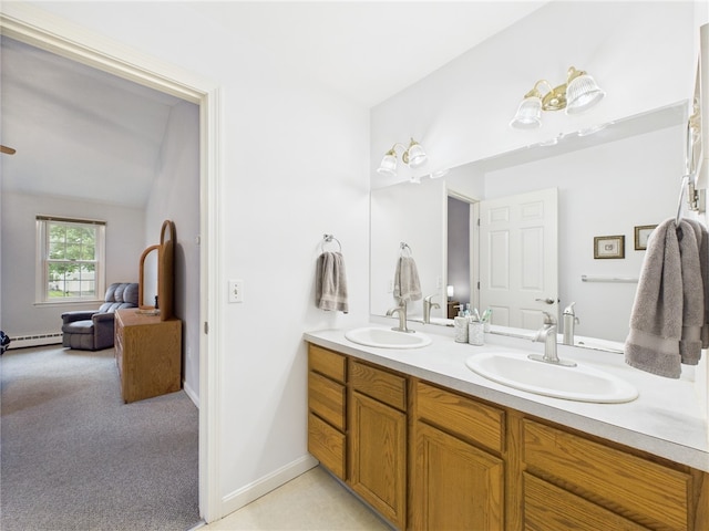 64 E Park Ln, South Kingstown, RI 02879 - full bathroom featuring double vanity, a baseboard heating unit, and lofted ceiling