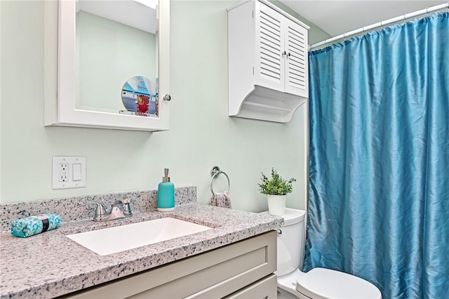 22 Pond View Dr, Little Compton, RI 02837 - bathroom with vanity, toilet, and curtained shower