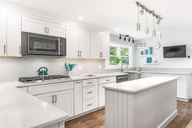 22 Pond View Dr, Little Compton, RI 02837 - kitchen with stainless steel appliances, wood finished floors, decorative backsplash, and recessed lighting
