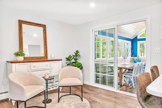 22 Pond View Dr, Little Compton, RI 02837 - sitting room featuring light wood finished floors, vaulted ceiling, and baseboards