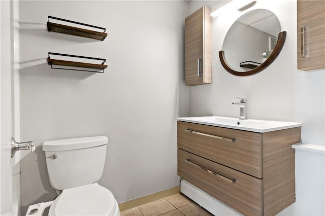 3940 Post Rd Unit 38, Warwick, RI 02886 - half bath with toilet, vanity, tile patterned flooring, and baseboards