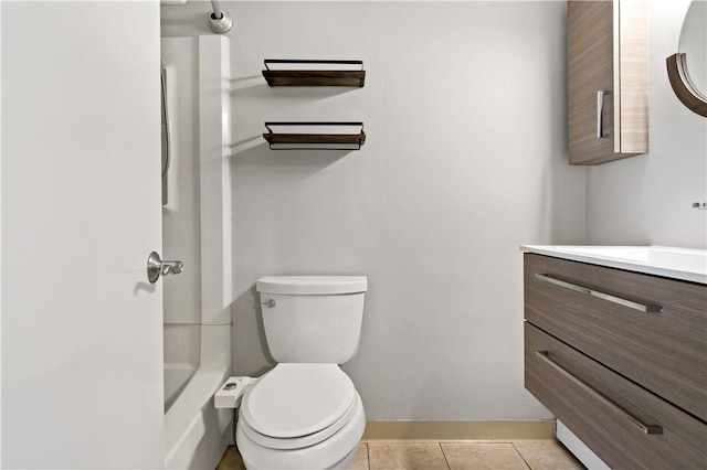 3940 Post Rd Unit 38, Warwick, RI 02886 - bathroom featuring vanity, toilet, baseboards, a shower, and tile patterned floors