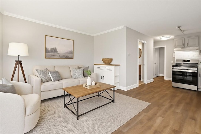 3940 Post Rd Unit 38, Warwick, RI 02886 - living room featuring wood finished floors, crown molding, and baseboards