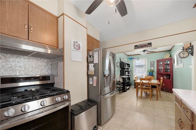 66 Dean Ave, Smithfield, RI 02917 - kitchen featuring appliances with stainless steel finishes, ceiling fan, under cabinet range hood, tasteful backsplash, and light countertops