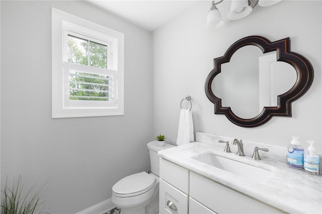 36 Wanda St, Narragansett, RI 02882 - bathroom with vanity, toilet, and baseboards