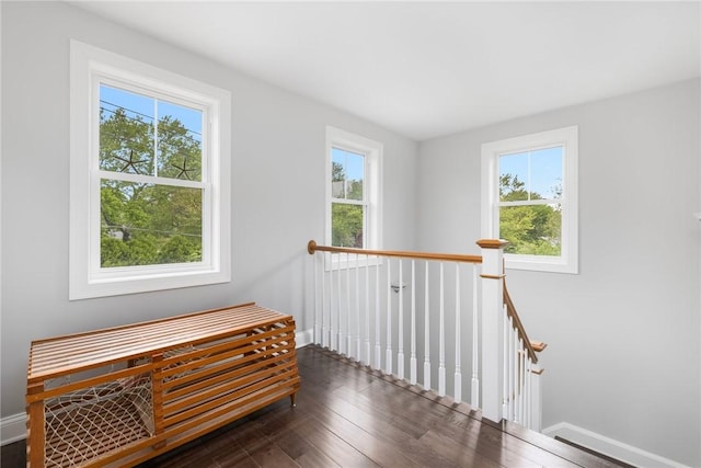 36 Wanda St, Narragansett, RI 02882 - hall featuring an upstairs landing, healthy amount of natural light, dark wood-style floors, and baseboards