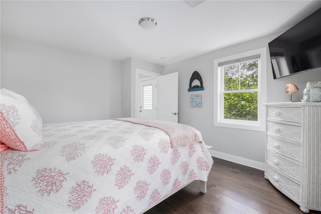 36 Wanda St, Narragansett, RI 02882 - bedroom with multiple windows, baseboards, and dark wood-type flooring