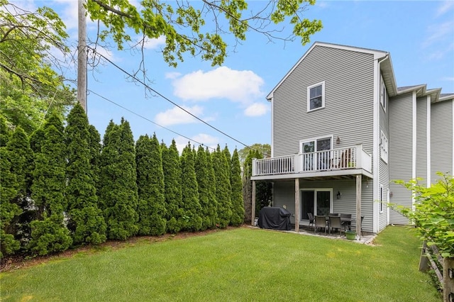 36 Wanda St, Narragansett, RI 02882 - rear view of property featuring a lawn and a patio area