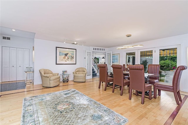 48 Wright Ln, Jamestown, RI 02835 - dining room featuring a chandelier, light wood-style flooring, rail lighting, and recessed lighting