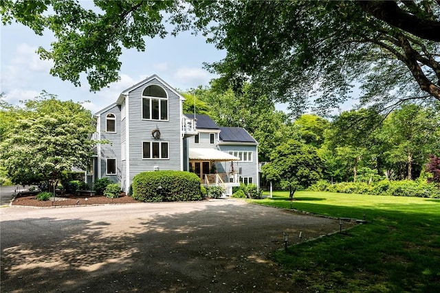 48 Wright Ln, Jamestown, RI 02835 - view of front of home with a front yard and driveway