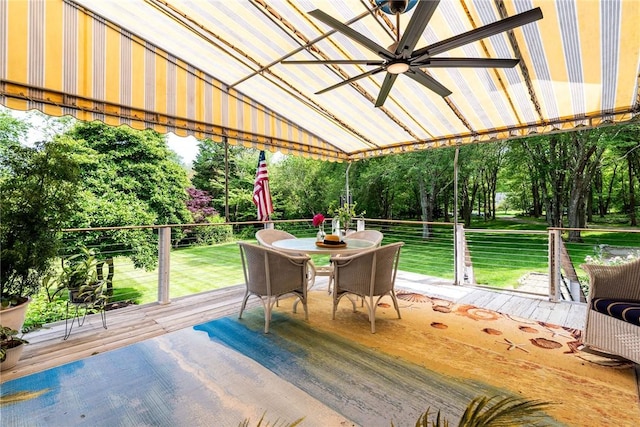 48 Wright Ln, Jamestown, RI 02835 - wooden terrace featuring outdoor dining area and view of scattered trees