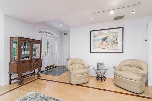48 Wright Ln, Jamestown, RI 02835 - living area featuring wood-type flooring, baseboards, recessed lighting, and rail lighting