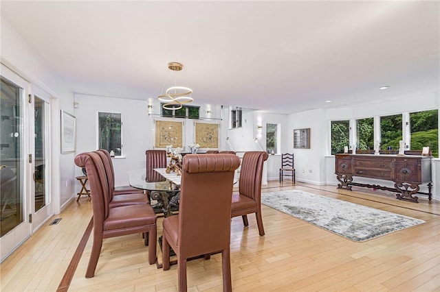 48 Wright Ln, Jamestown, RI 02835 - dining area featuring light wood-style floors, a chandelier, recessed lighting, and baseboards