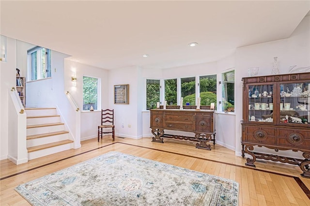 48 Wright Ln, Jamestown, RI 02835 - sitting room featuring wood-type flooring, stairs, baseboards, and recessed lighting