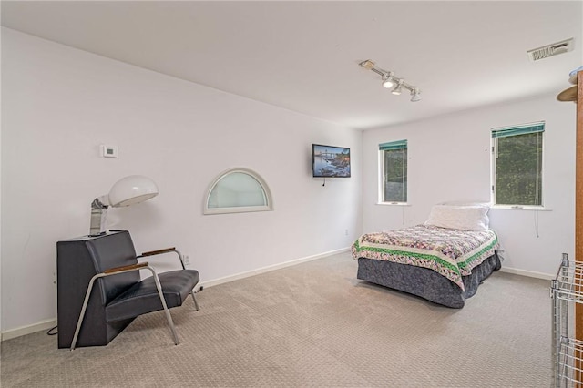 48 Wright Ln, Jamestown, RI 02835 - carpeted bedroom featuring rail lighting and baseboards
